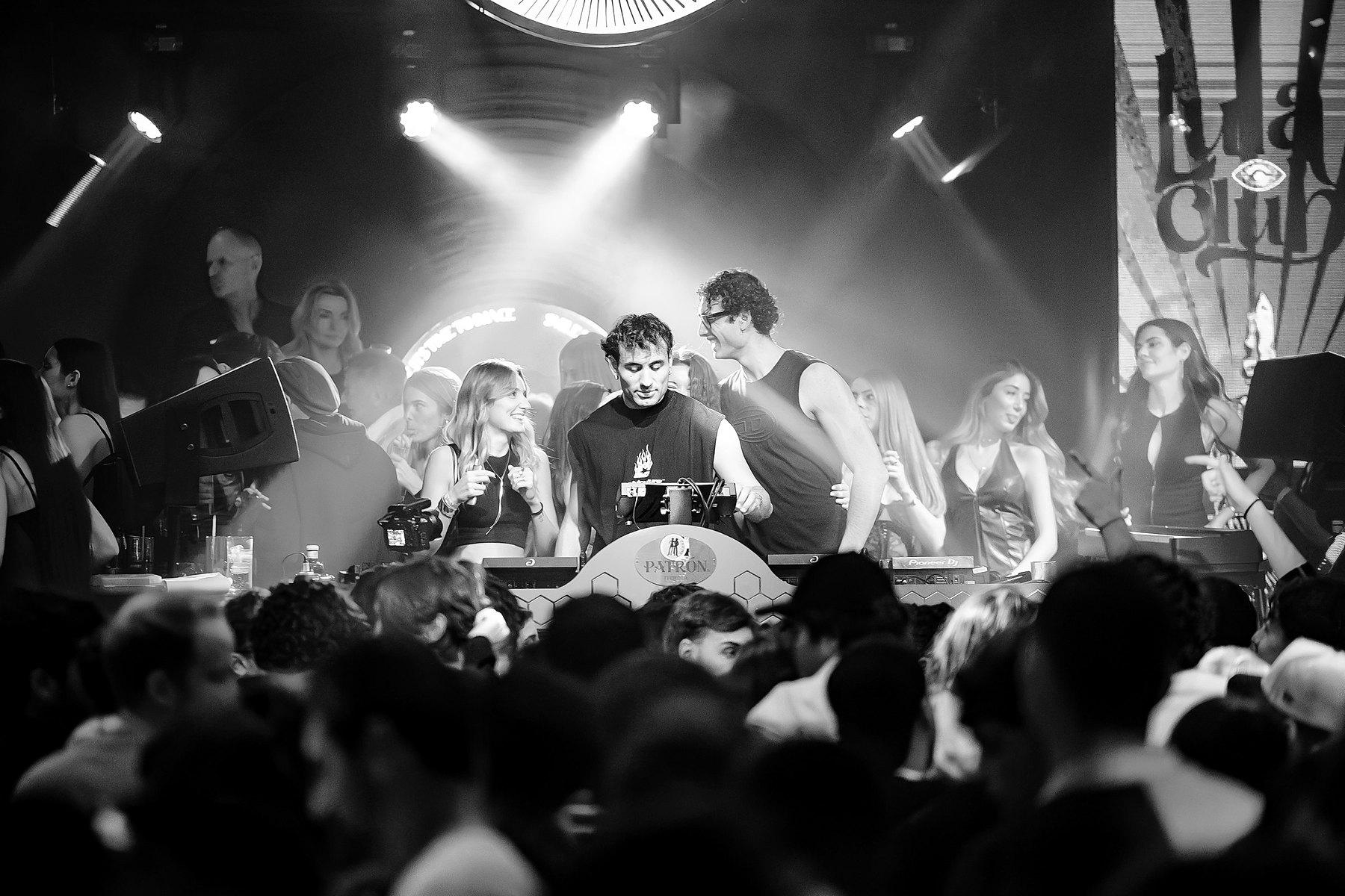 COLLISION in the booth at Lula Club, Madrid, in front of the crowd, black and white photograph · PLAYNOW